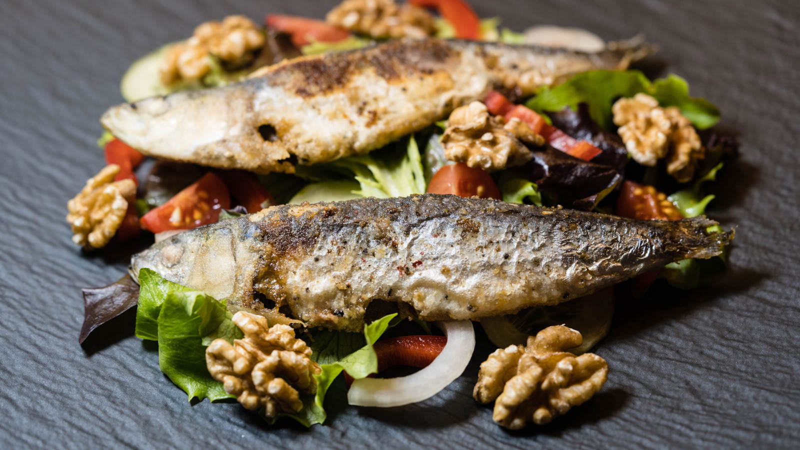 Image of Grilled Sardines with Walnut and Olive Salad