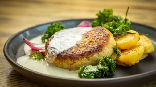 Image of Cod and Prawn Fish Cakes with Lemon Sauce, Kale and Potatoes