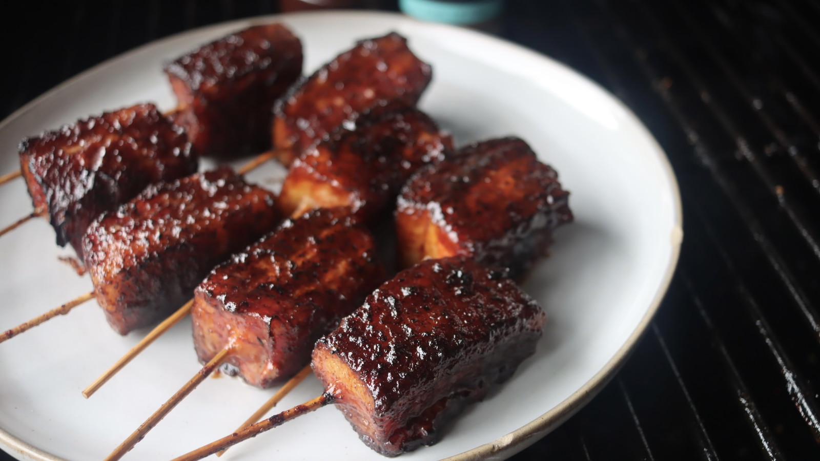 Image of Candied Pork Belly Lollipops with Hot Honey Drizzle
