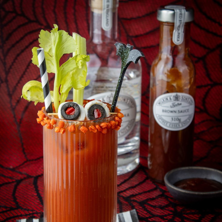 Image of Garnish with the mozzarella and black olive “eyeballs” and
enjoy your Witches’ Brew!