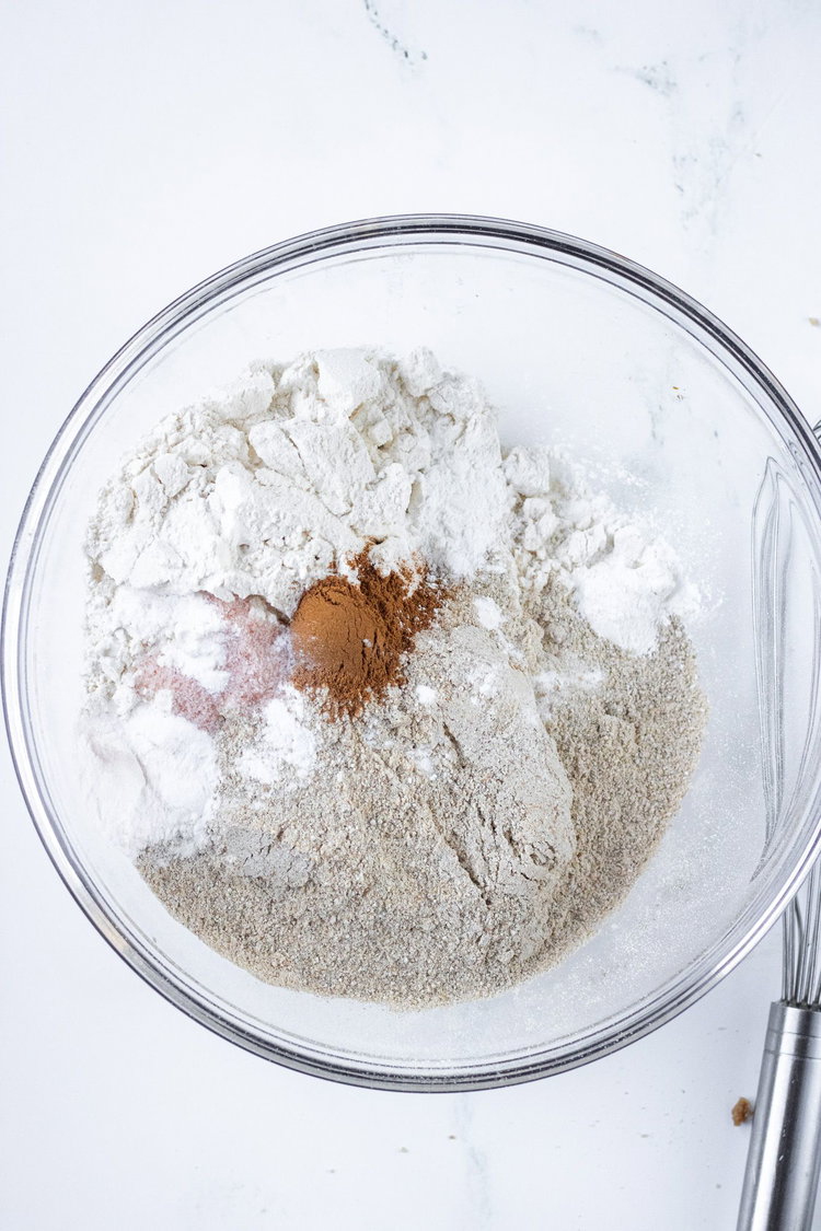 Image of Mix together the flour, soda, powder, cinnamon in a bowl.