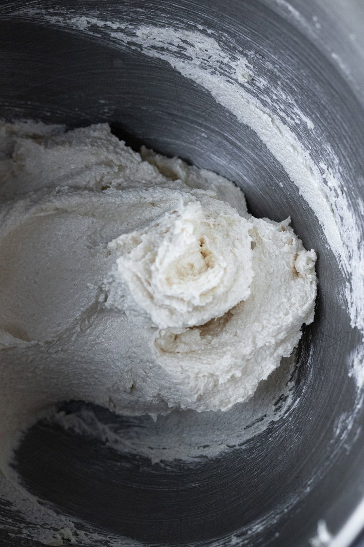 Image of In a mix beat together butter, and sugars at a...