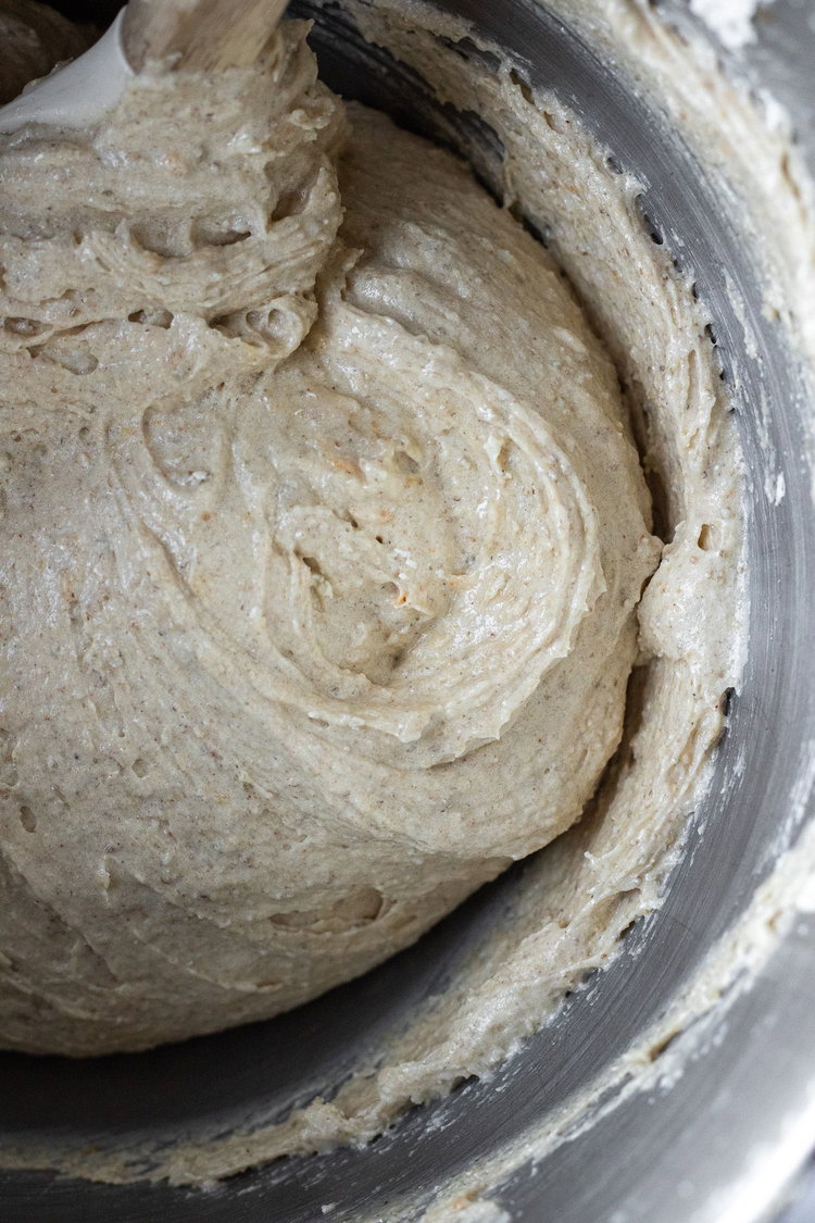 Image of Gently stir in flour, milk and orange juice.