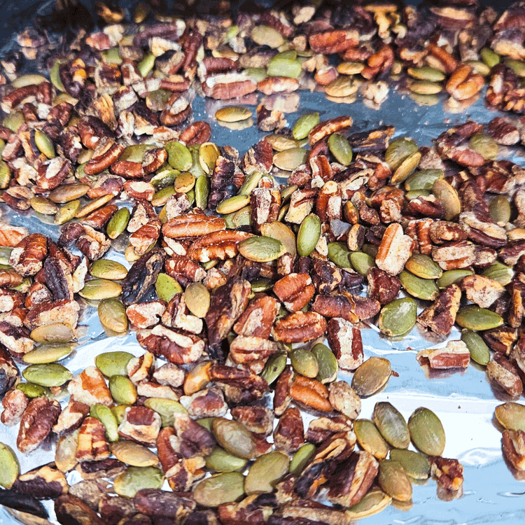 Image of OPTIONAL: gently roast the nuts and seeds to give them some extra crunch. place them in a dry pan and toss over med-high heat for a few min or place on foil in a toaster oven. Watch closely so they...