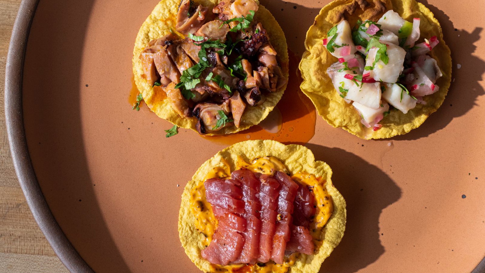 Tostadas topped with seafood