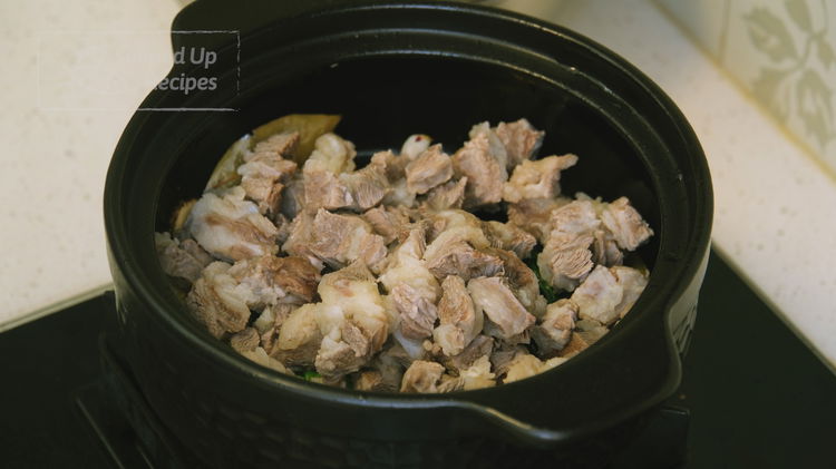 Image of Preheat the clay pot over medium heat for about a...