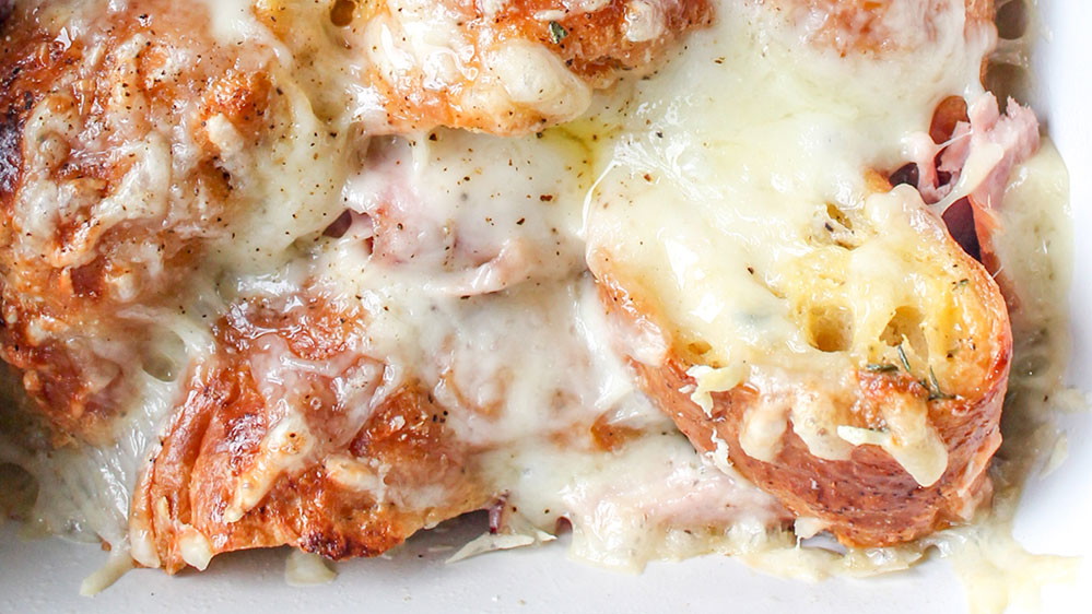 ham and cheese bake up close in white dish