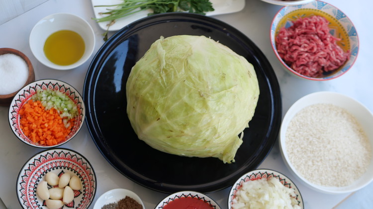 Image of The night before, place the whole cabbage in the freezer.