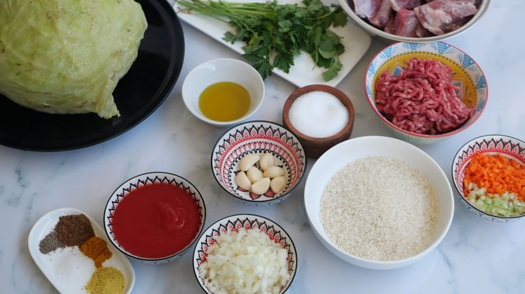 Image of In a large bowl, combine the rice, ground beef, onions,...