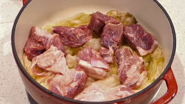 Image of Add the 800 g of beef and bones, this forms a rich base and prevents sticking season liberally with salt and pepper.