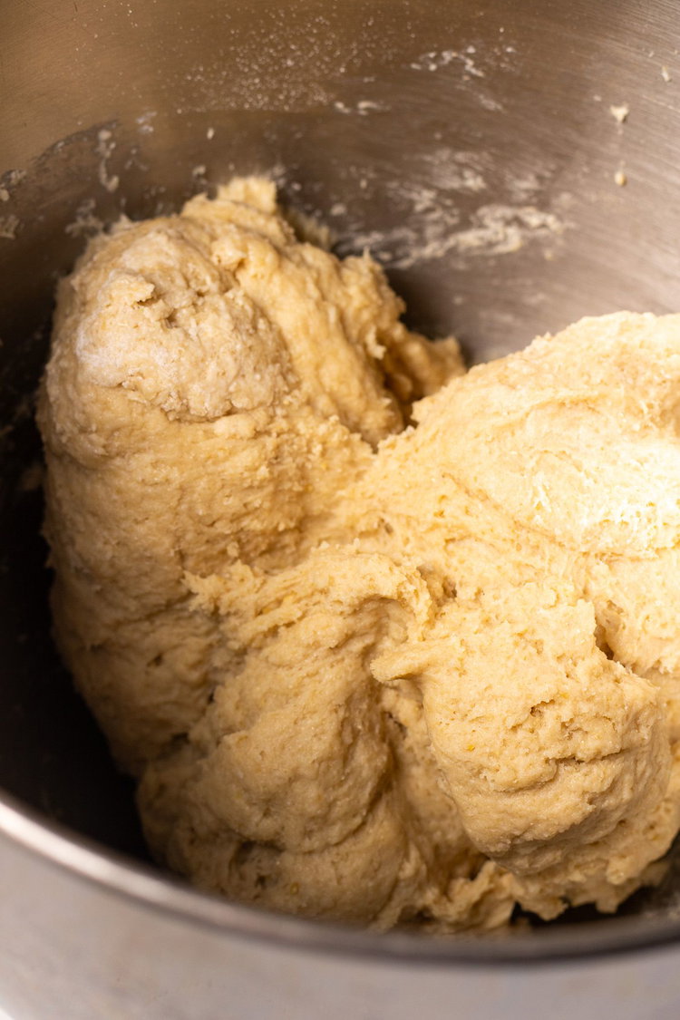 Image of Mix with a dough hook until the flour is thoroughly...