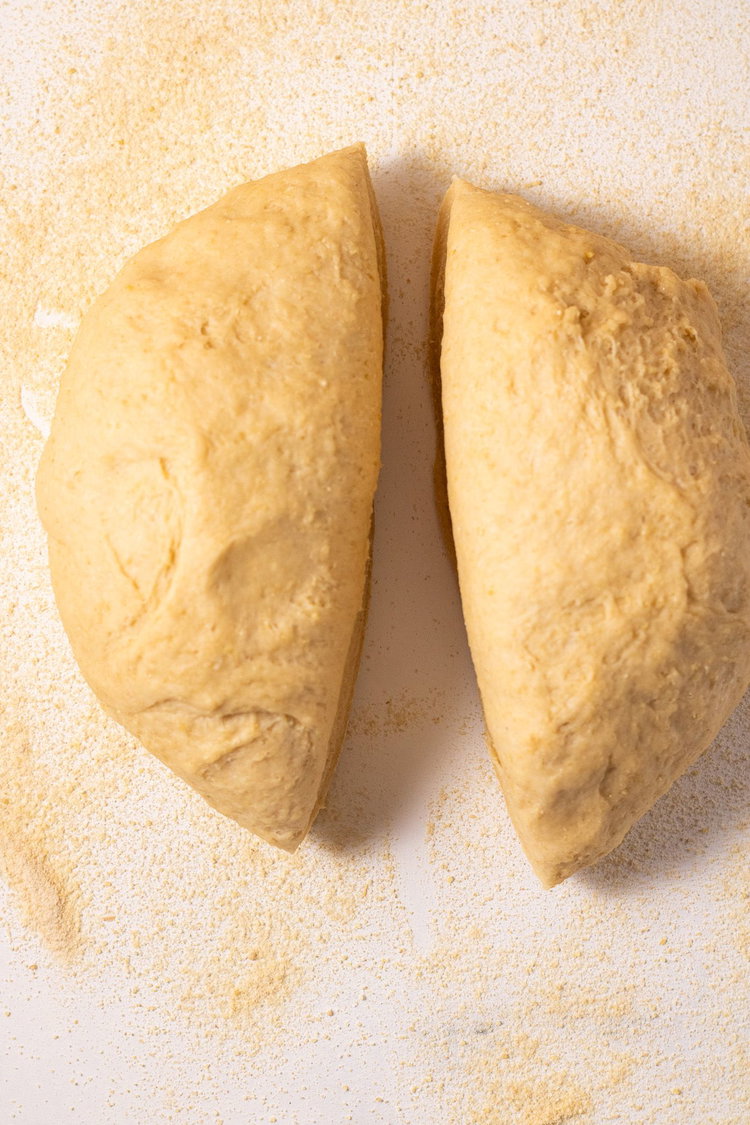 Image of Turn the dough out onto a lightly floured surface. Divide...