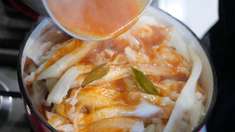 Image of Pour the sauce evenly over the rolls until just covered.