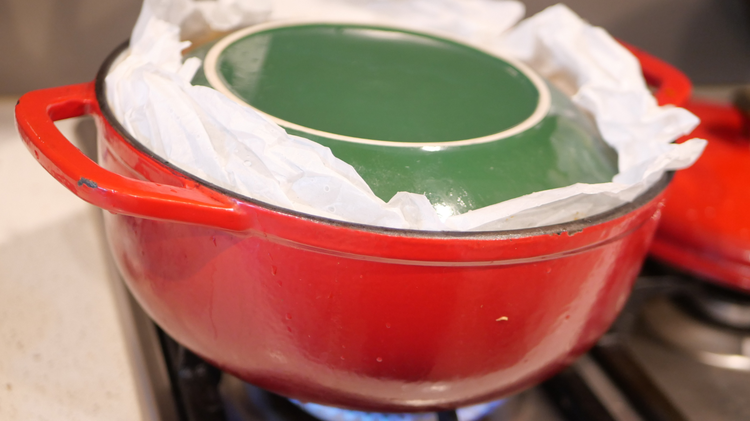 Image of Place a heat-proof plate or lid over the top to...