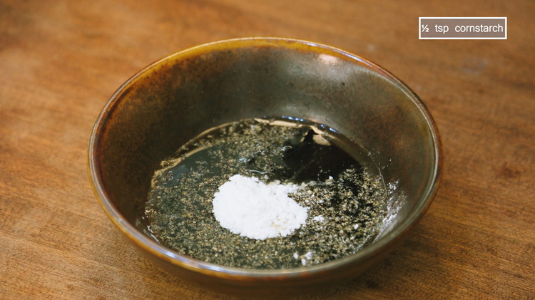 Image of To make the quick stir-fry sauce, simply combine 1.5 Tbsps oyster sauce, 2 tsps soy sauce, 1 tsp sugar, a touch of ground black pepper, 1 tbsp of water, and 1/2 tsp of cornstarch.