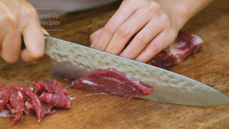 Image of Slice the beef into 1/8 of an inch thick pieces....