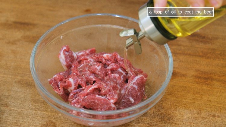Image of Marinate the beef with 1/4 tsp of salt, 1/8 tsp of baking soda, 2 tsp of cornstarch, and 1/2 tbsp of Chinese cooking wine. Mix thoroughly. Last, add a drizzle of oil and mix to coat it. This helps to...