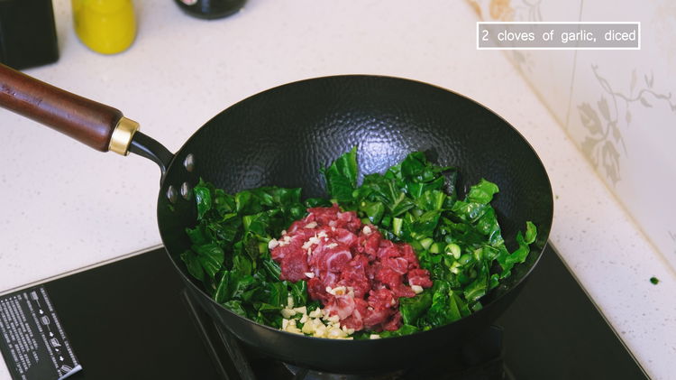 Image of Add the beef and some diced garlic. Stir until the...