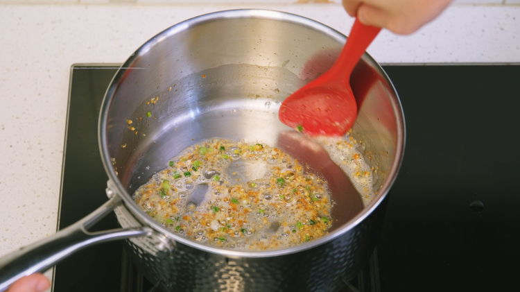 Image of In a stock pot, add 1.5 tbsp of cooking oil,...