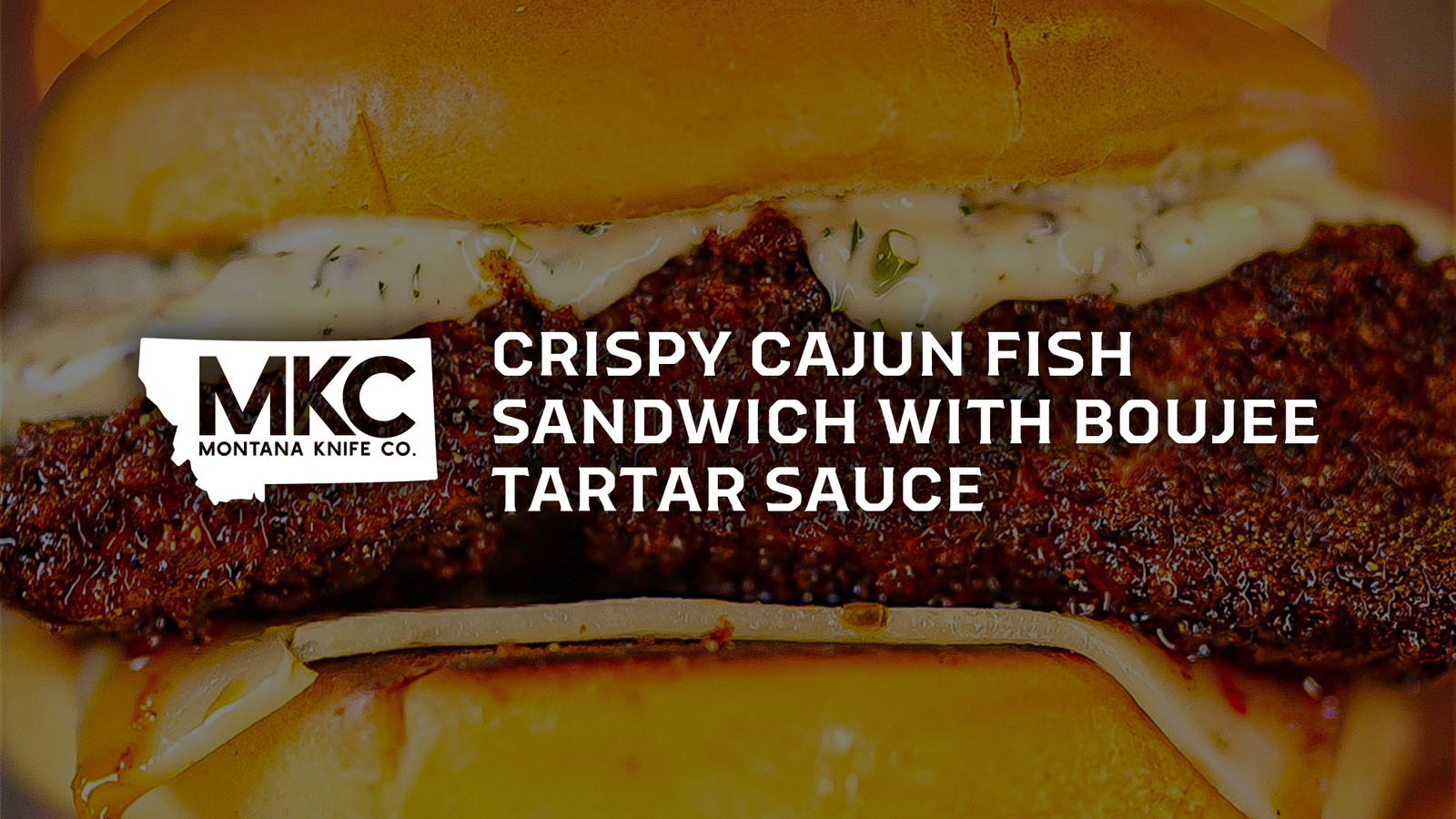 A crispy Cajun fish sandwich on a golden brioche bun.