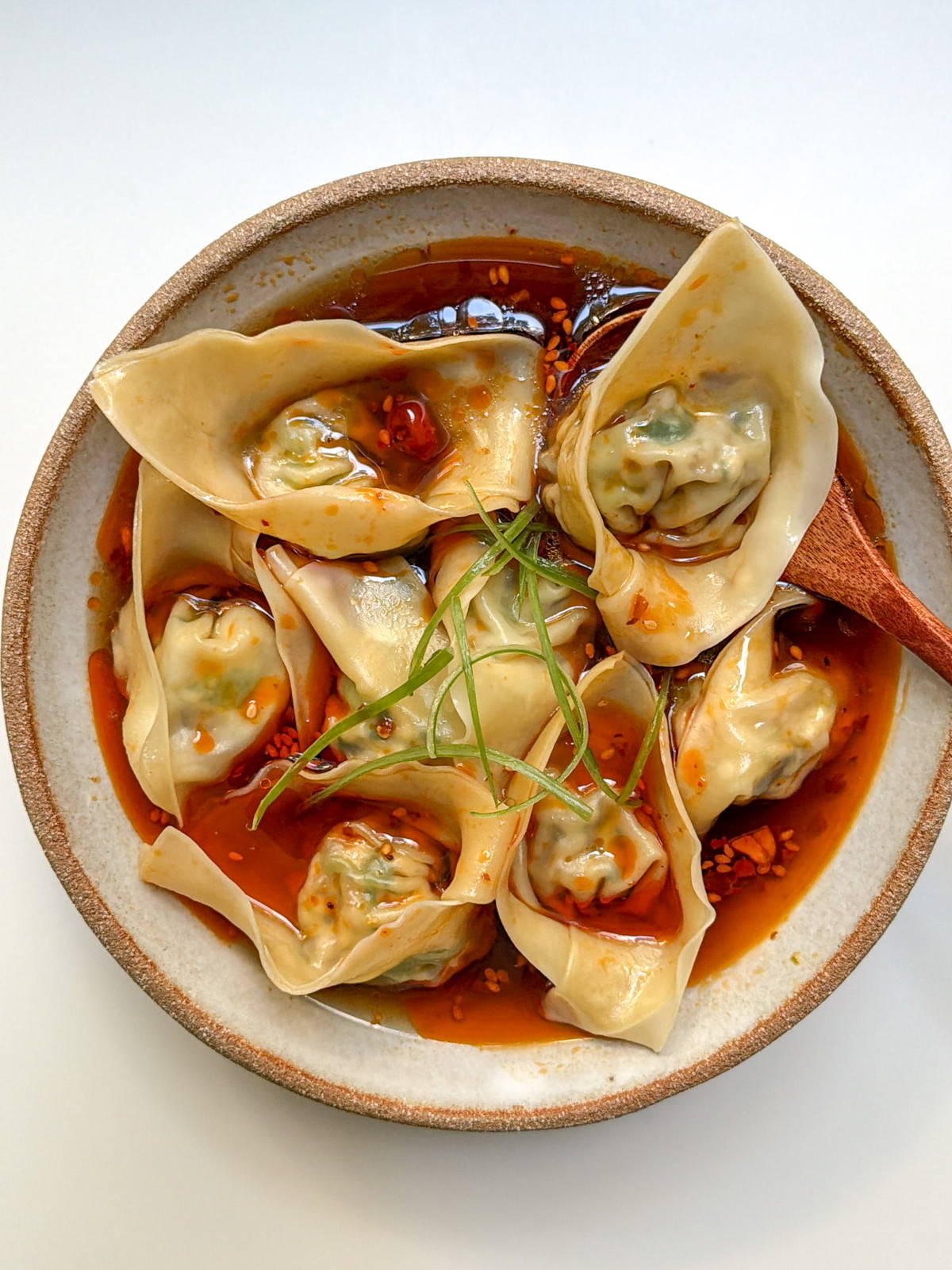 Vegan wontons in spicy and sour broth. 丨酸辣素馄饨