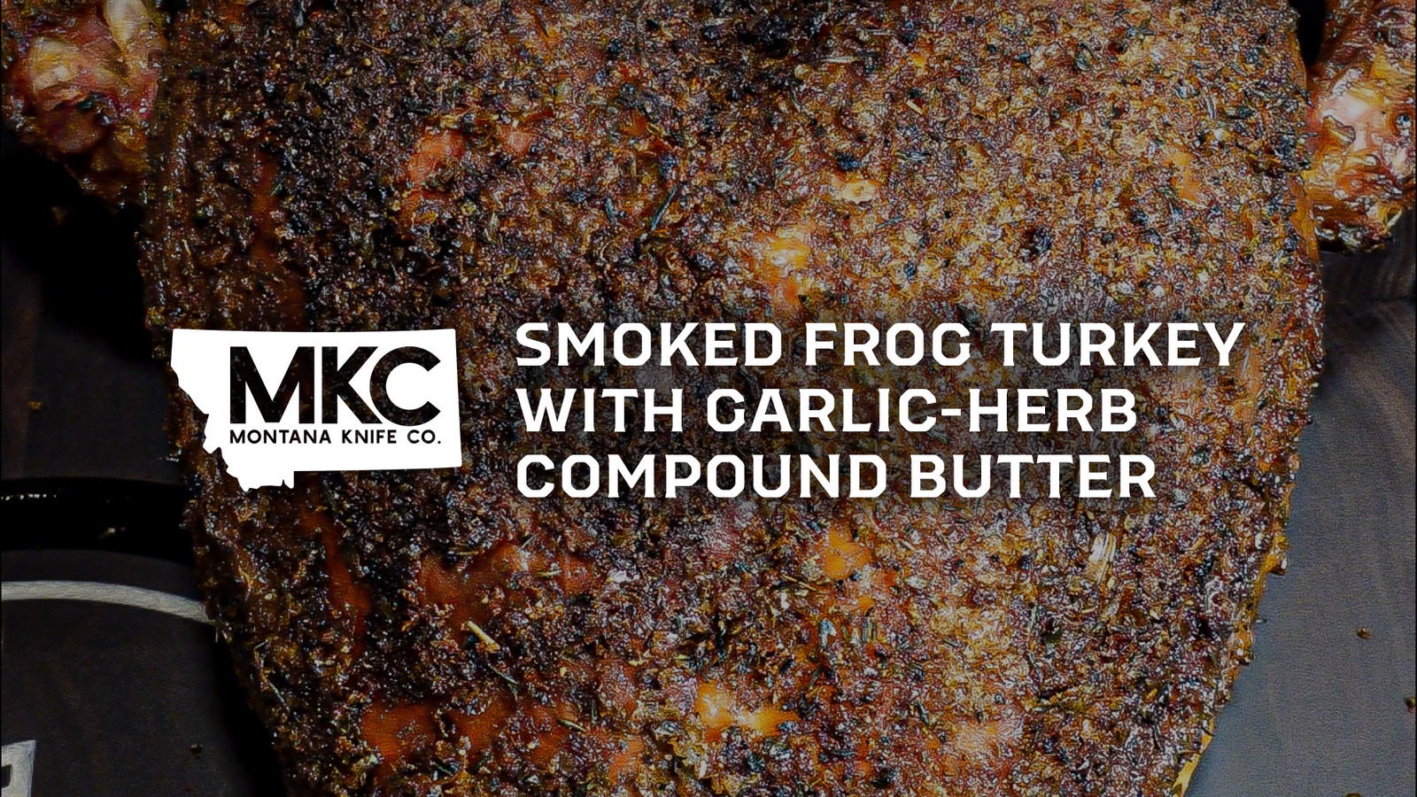 Close-up of smoked frog-style turkey, with crispy skin and Cajun garlic-herb seasoning.