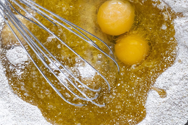 Image of Mix together flours, sugar, soda, spices in a bowl. Add...