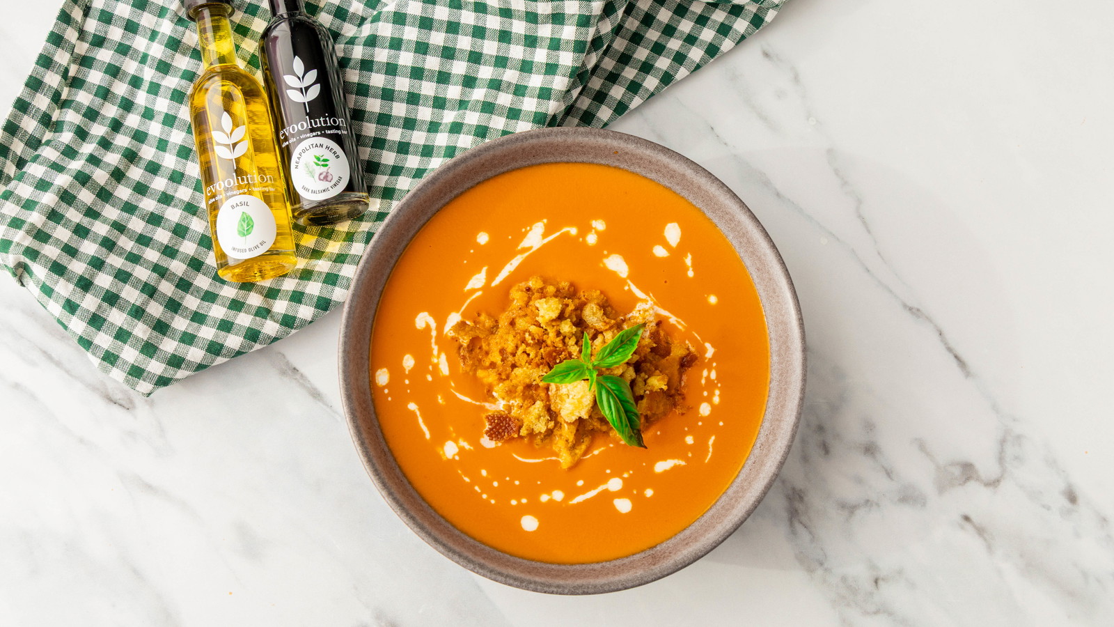 Image of Creamy Tomato Soup and Pangrattato with Basil Olive Oil and Neapolitan Herb Balsamic