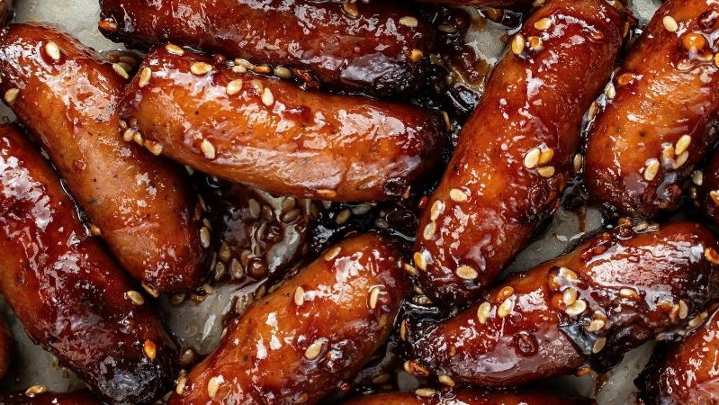Image of Sticky Damson and Sesame Sausages