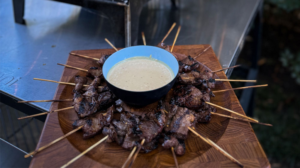 Marinated Flank Steak with Cashew Ginger Sauce