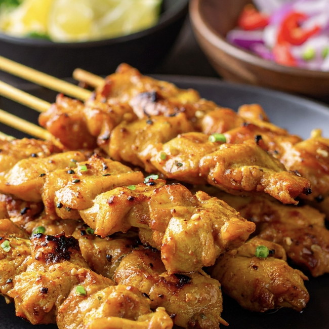Image of ginger peanut chicken skewers with coconut rice