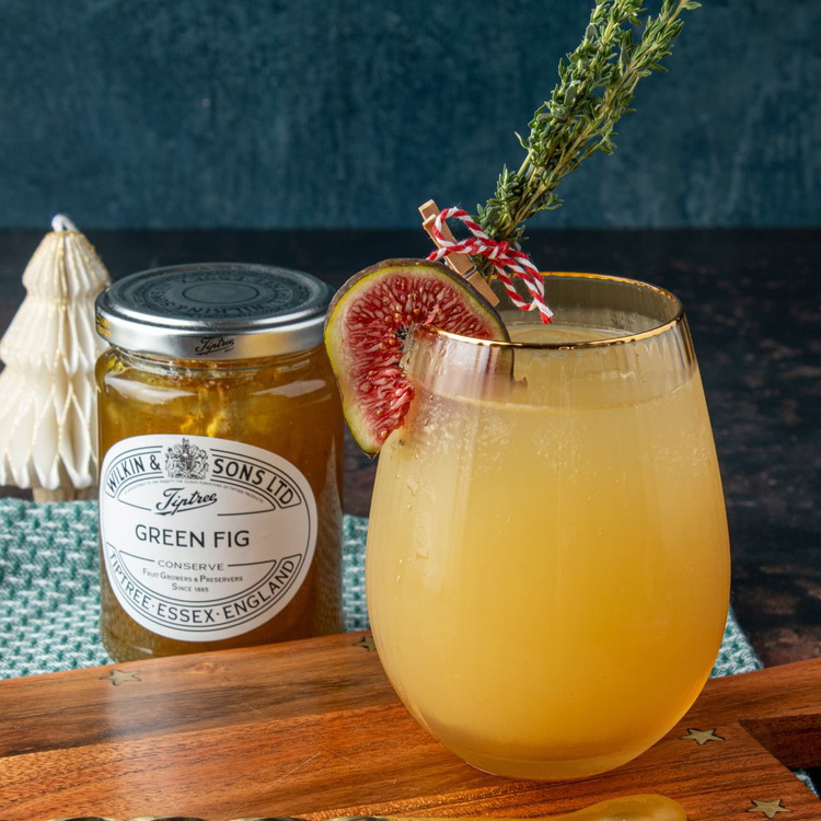 Image of Cut a slit in a slice of fig and perch it on the rim of the glass. Attach the bunch of thyme to the glass on an upright angle with a tiny peg, otherwise lay the thyme sprig on top...