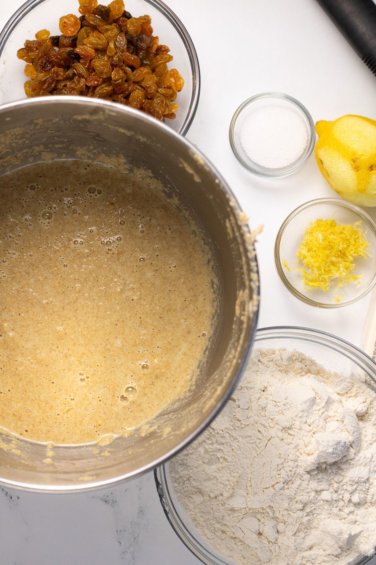 Image of Next add in salt, butter, lemon zest, raisins and 2...