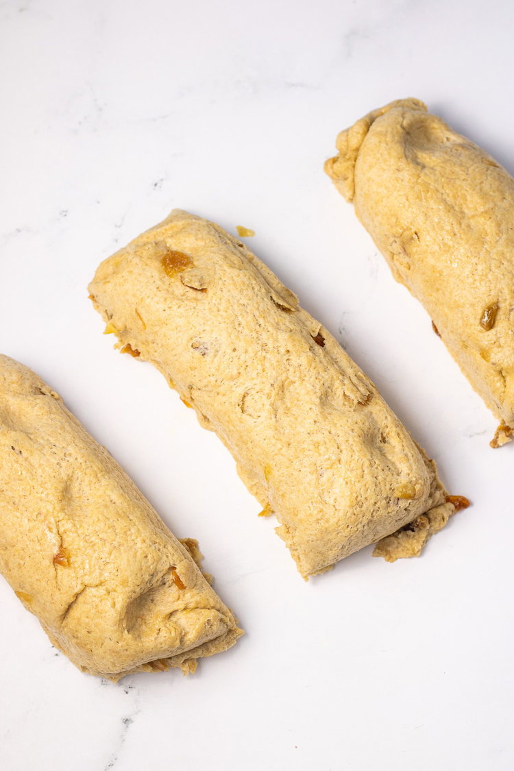 Image of Next shape the dough into 3 logs. You may need...