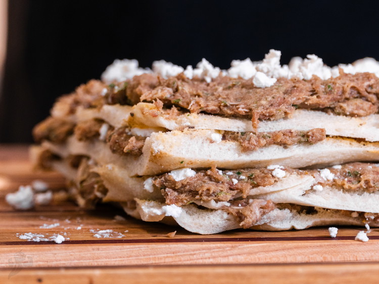 Image of Spread the spice mix for the meat over the ground beef, lamb, and drained and squeezed grated onions. Mix it all until well combined. I recommend putting on a disposable glove and then mixing with your hands. You can also...