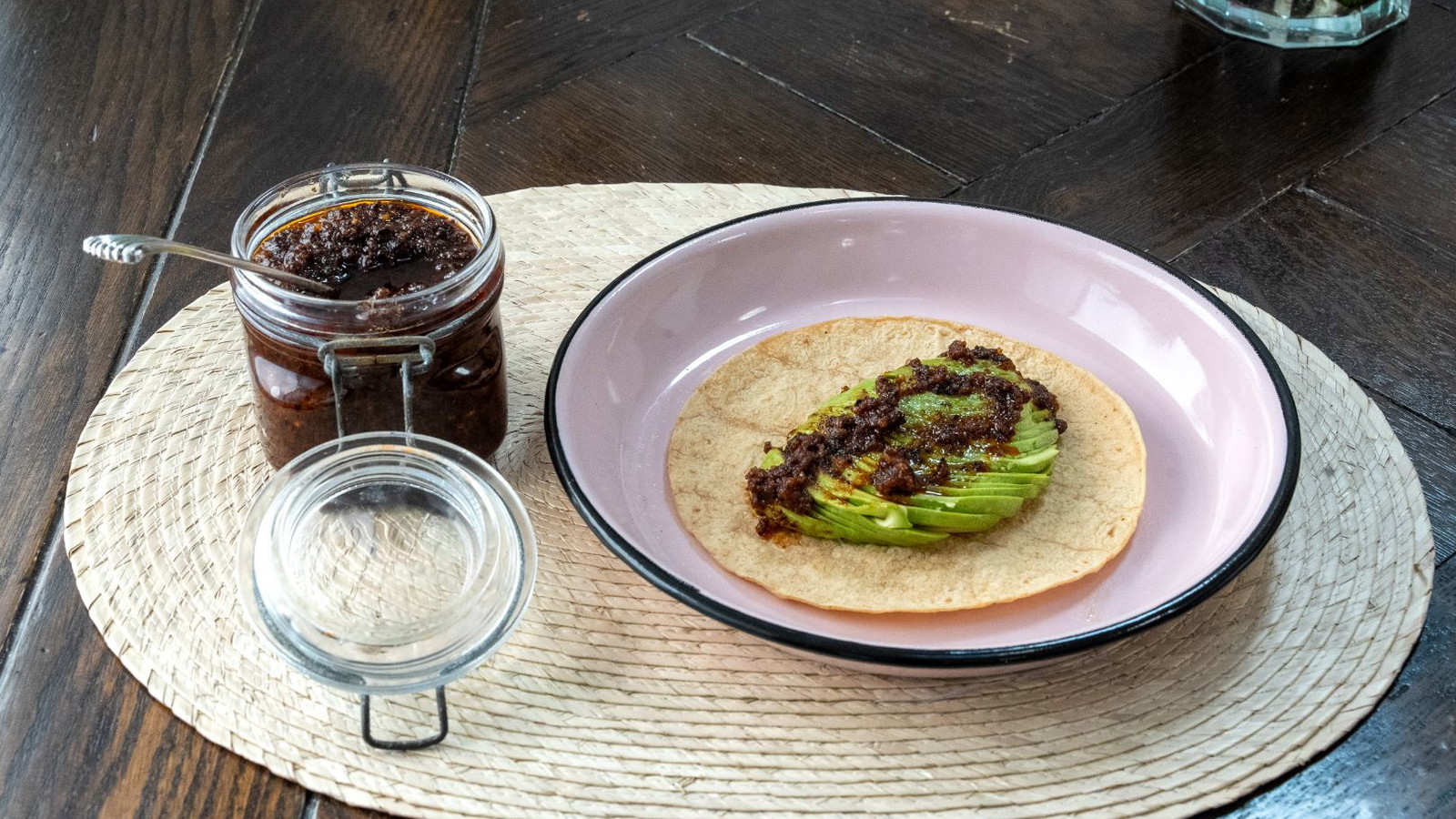 Avocado taco topped with Pecan Morita Salsa Negra