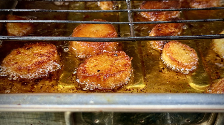 Image of add spuds to hot oil very slowly