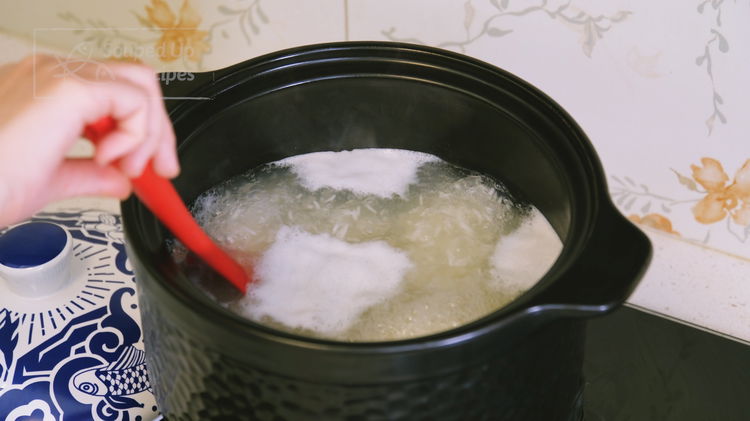 Image of Drain the rice completely and add it to the boiling...