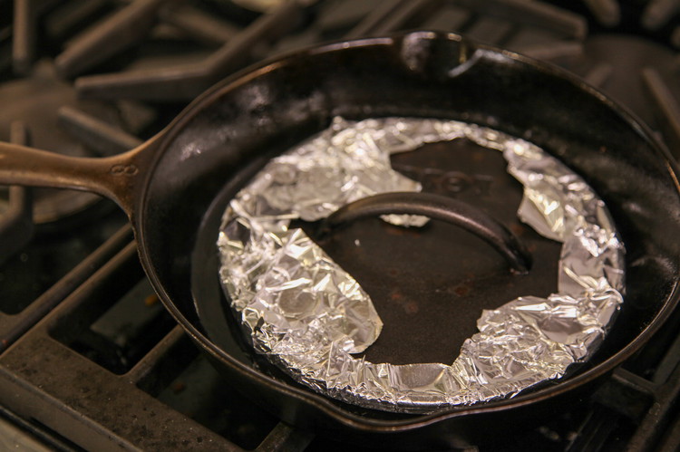 Image of Cook your bacon how you like. I use a cast iron skillet and a cast iron weight to keep them super flat. For this recipe I pre-cut the slices so I would have one piece per egg. So each rasher...