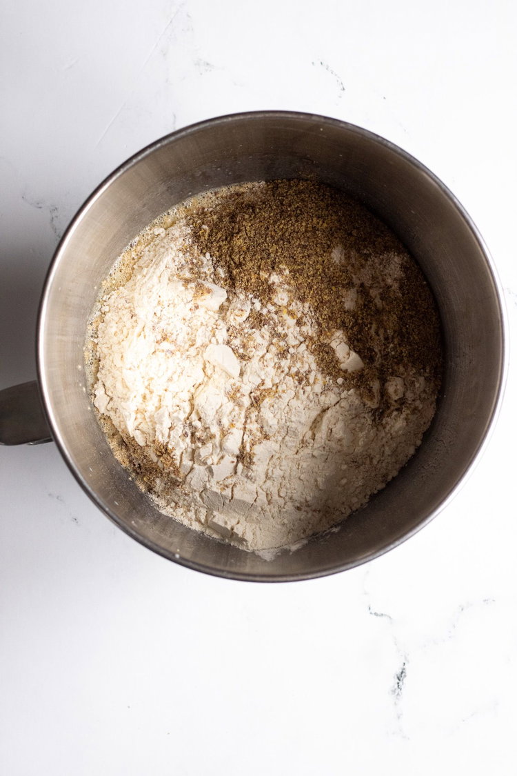 Image of Add in your flour mixture and salt. Mix together with...