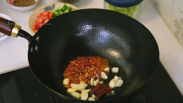 Image of Add about 2 tbsp of oil, diced garlic, 1-2 Tbsp...