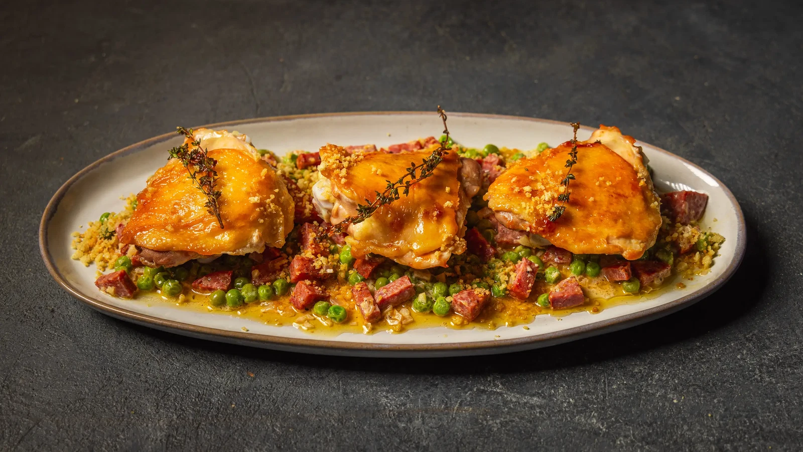 Image of Chicken Thighs with Chorizo and Peas