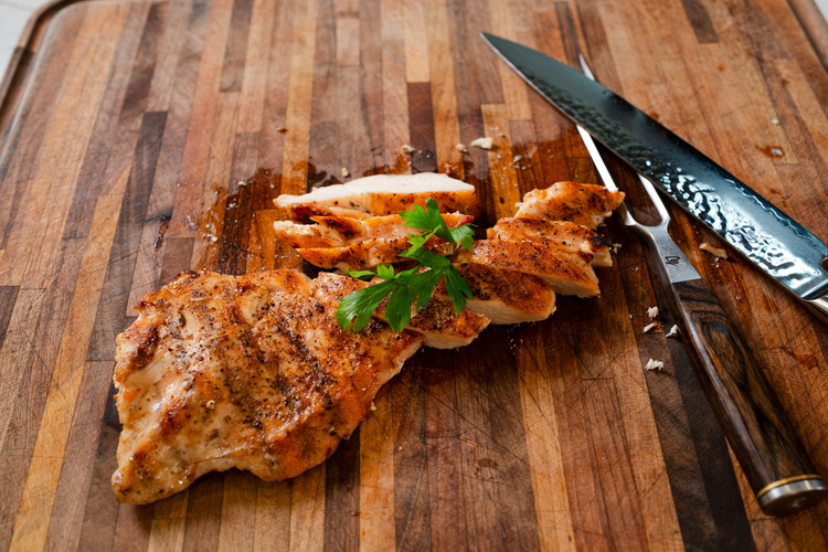 Image of Add oil to the surface of the meat right before placing on the grill. Over a medium/high heat, ideally with about 6 or so inches between the chicken and the coals, grill 5 minutes per side until the internal temp...