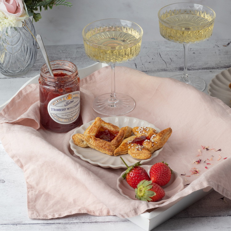 Image of Bake for around 15-20 minutes until golden and risen. Leave to cool and add some extra conserve on top if necessary, before serving. Dust the pastries with icing sugar for a pretty effect. Serve warm or cold.