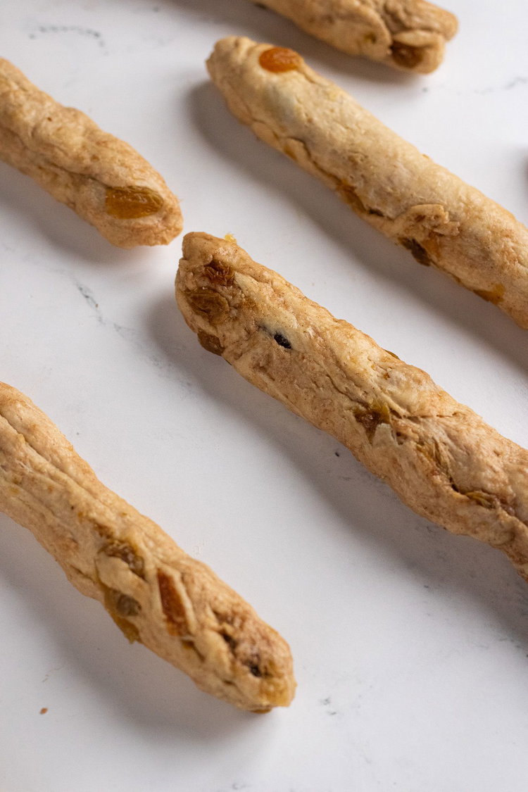 Image of Roll each bagel into a log form .