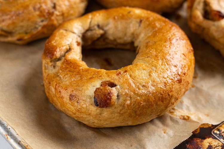 Image of Place bagels on a line cookie sheet. Bake for 20-25...