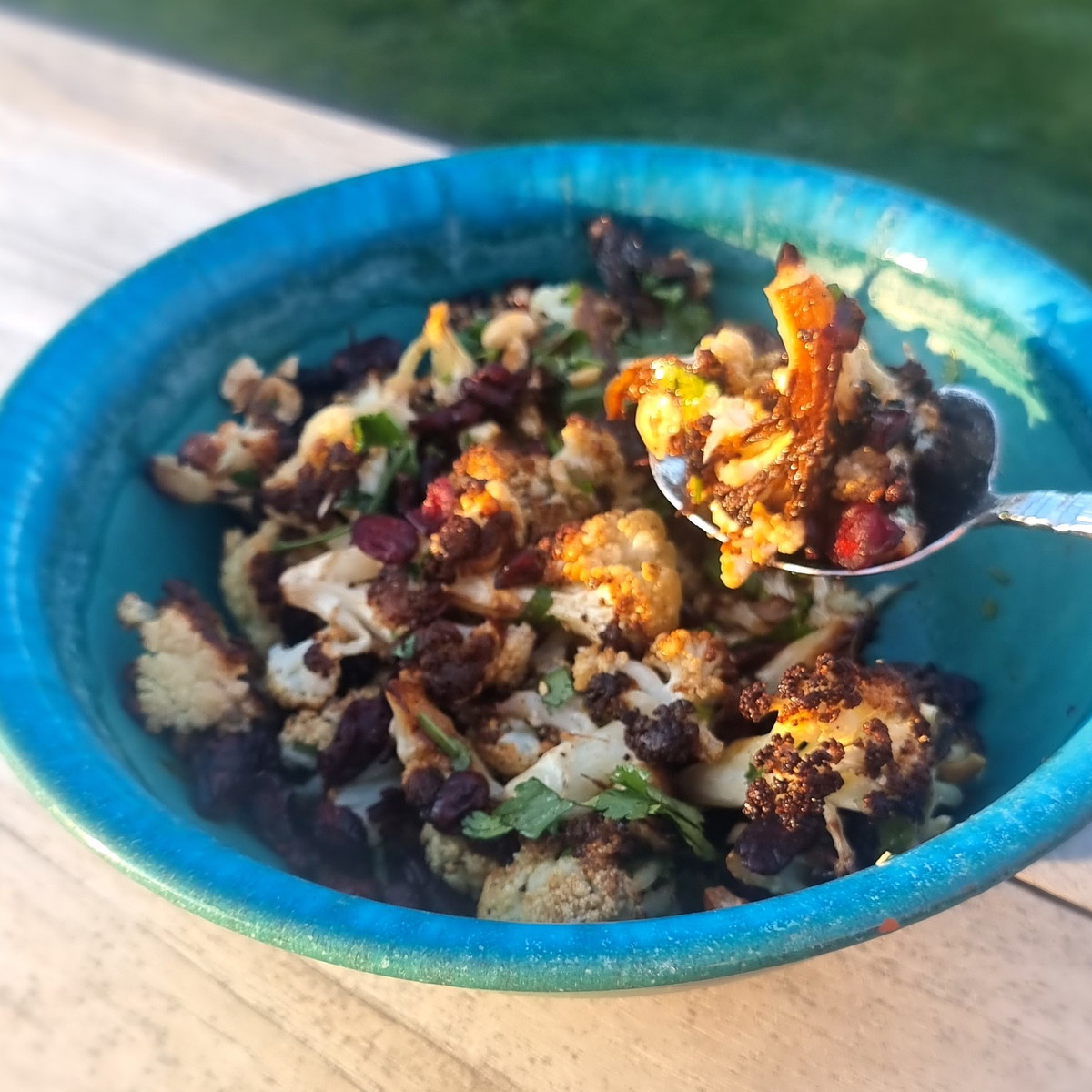 Roast Cauliflower Salad with spiced black garlic dressing