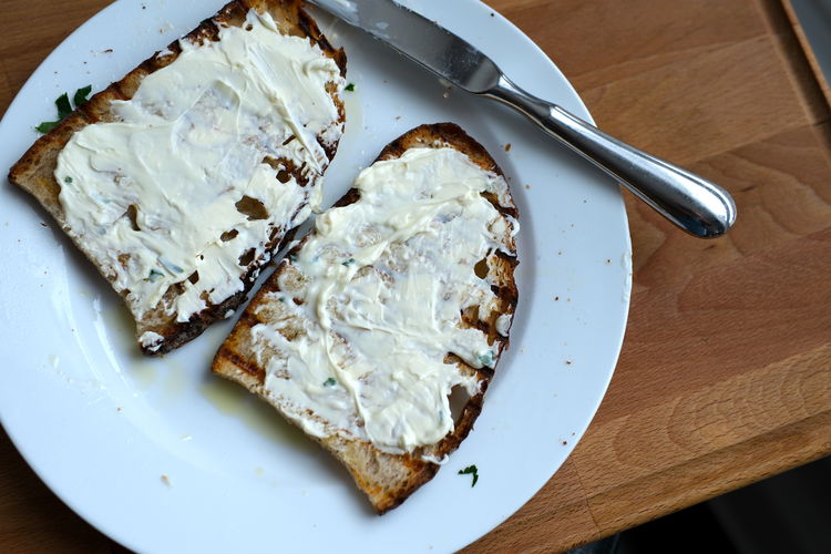 Image of Spread bread with a layer of mascarpone.  Think a thicker...