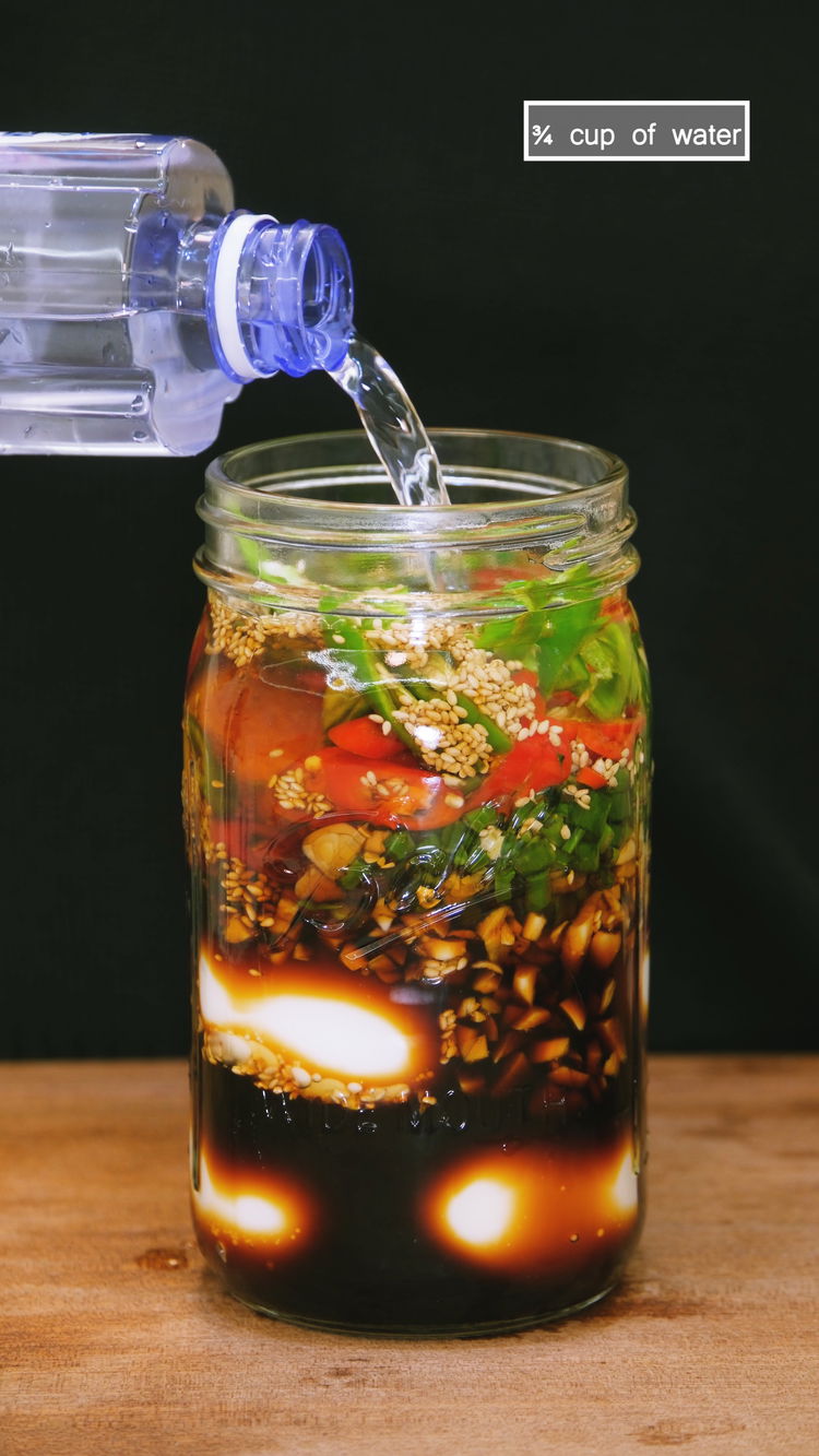 Image of Add the peeled eggs to a mason jar, and follow...