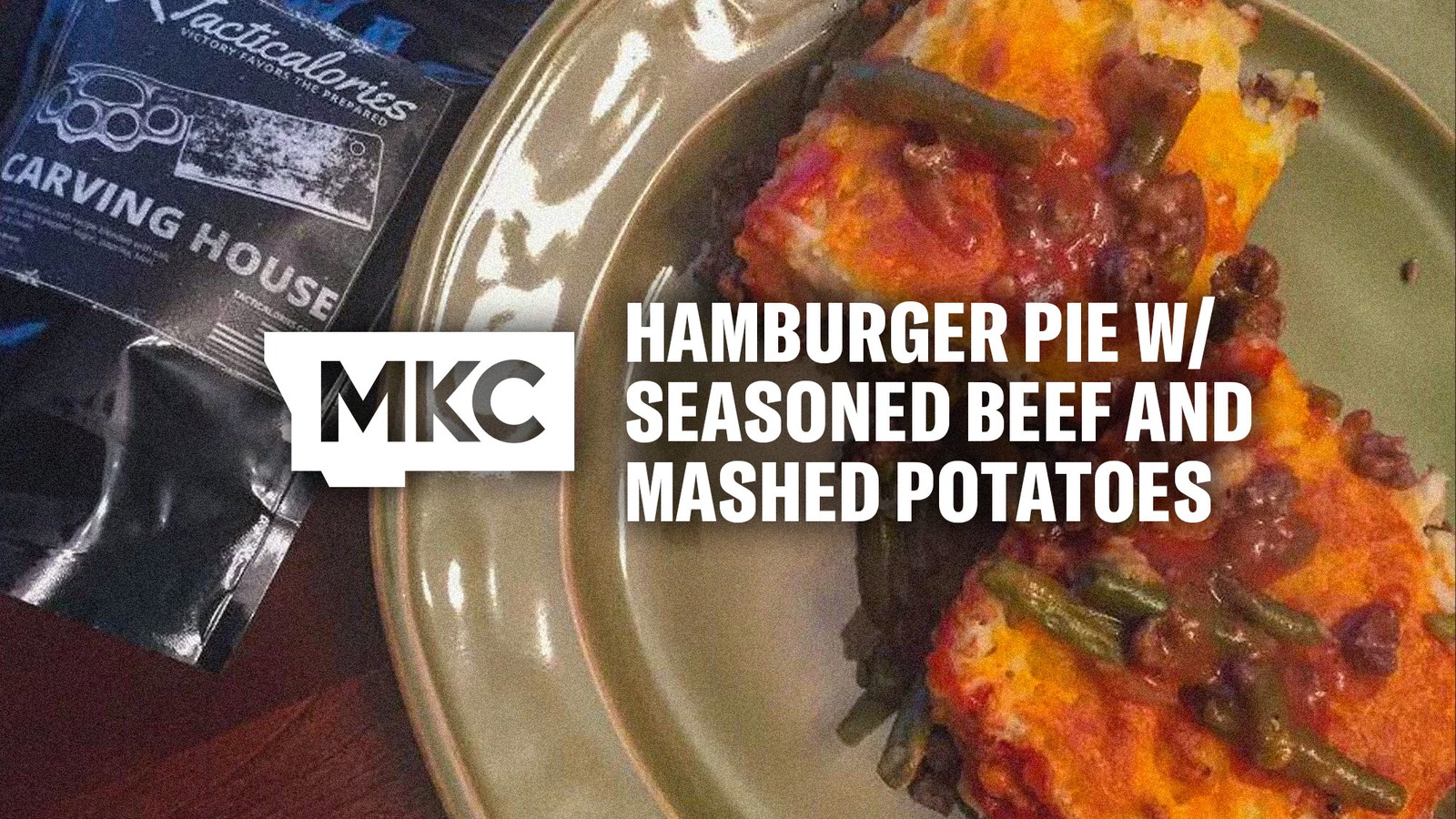 Close‑up of hamburger pie showing layers of beef, green beans, mashed potatoes, and melted cheese on a plate.